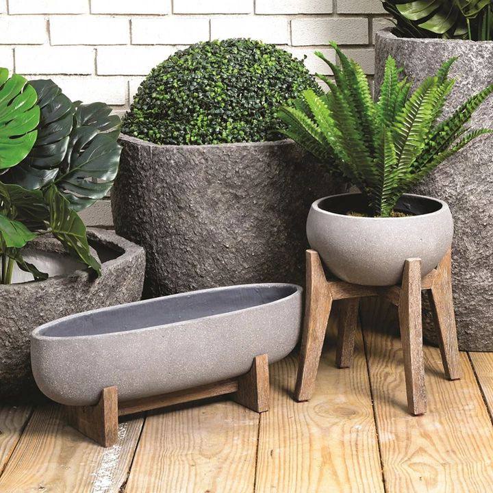 Image 5: grey concrete planter collection on wood decking